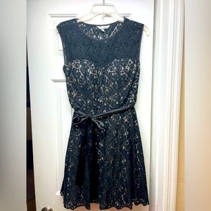 XL black lace and cream dress. Above the knee.